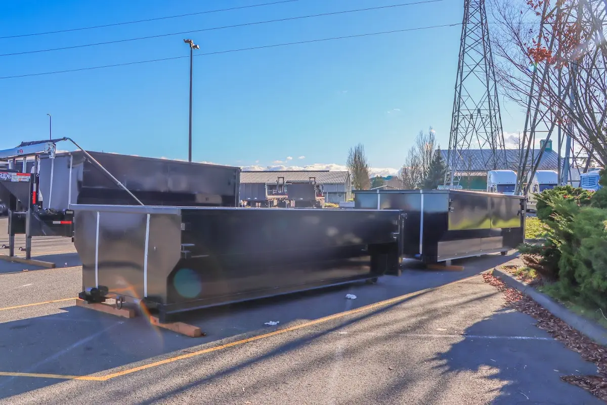 Roll-off dumpster ready for waste disposal at job site for Construction Dumpster Rental in Haverhill